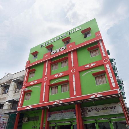 Capital O 615 Residence Puri Hotel Syariah Medan Buitenkant foto