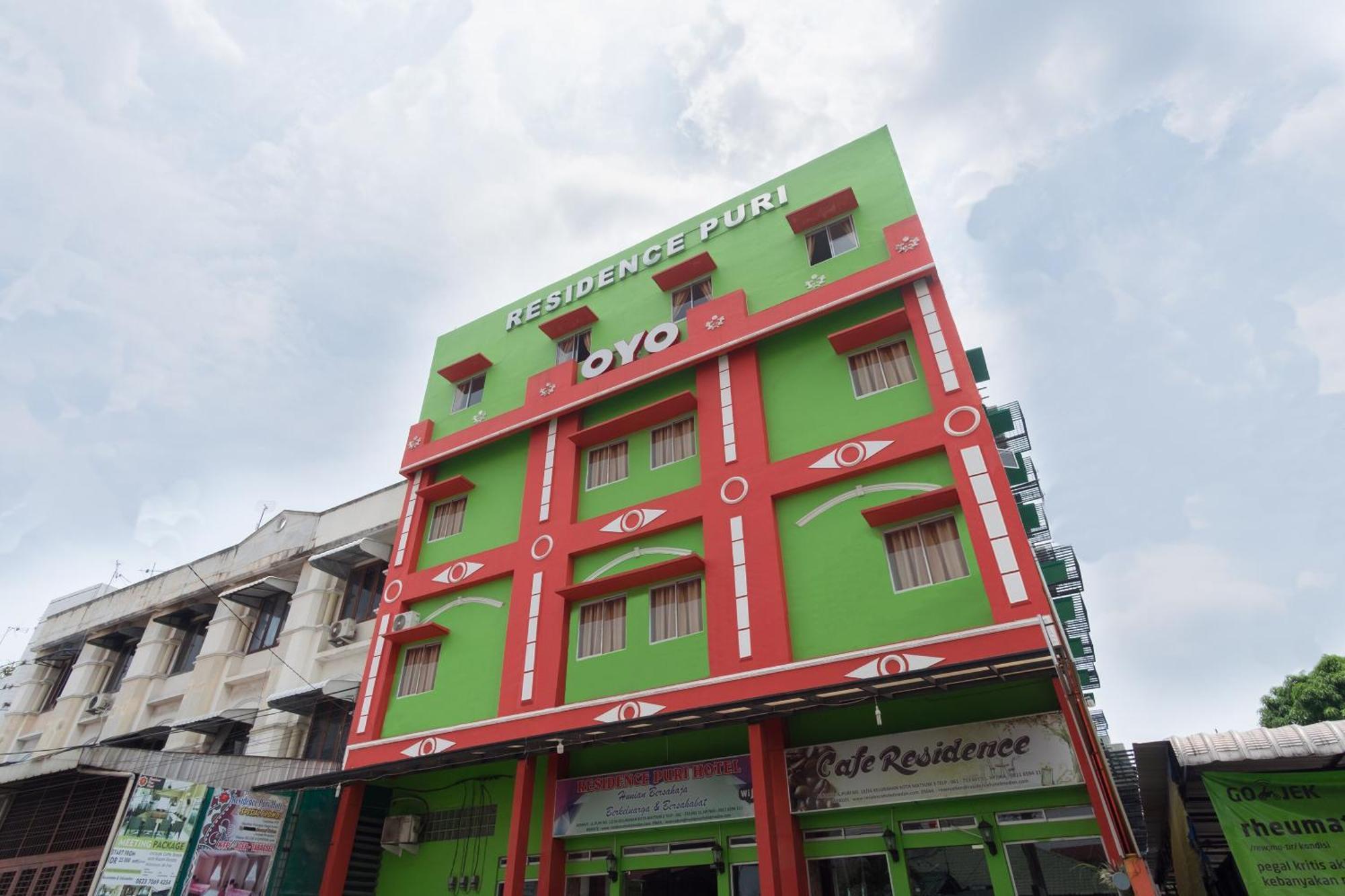 Capital O 615 Residence Puri Hotel Syariah Medan Buitenkant foto