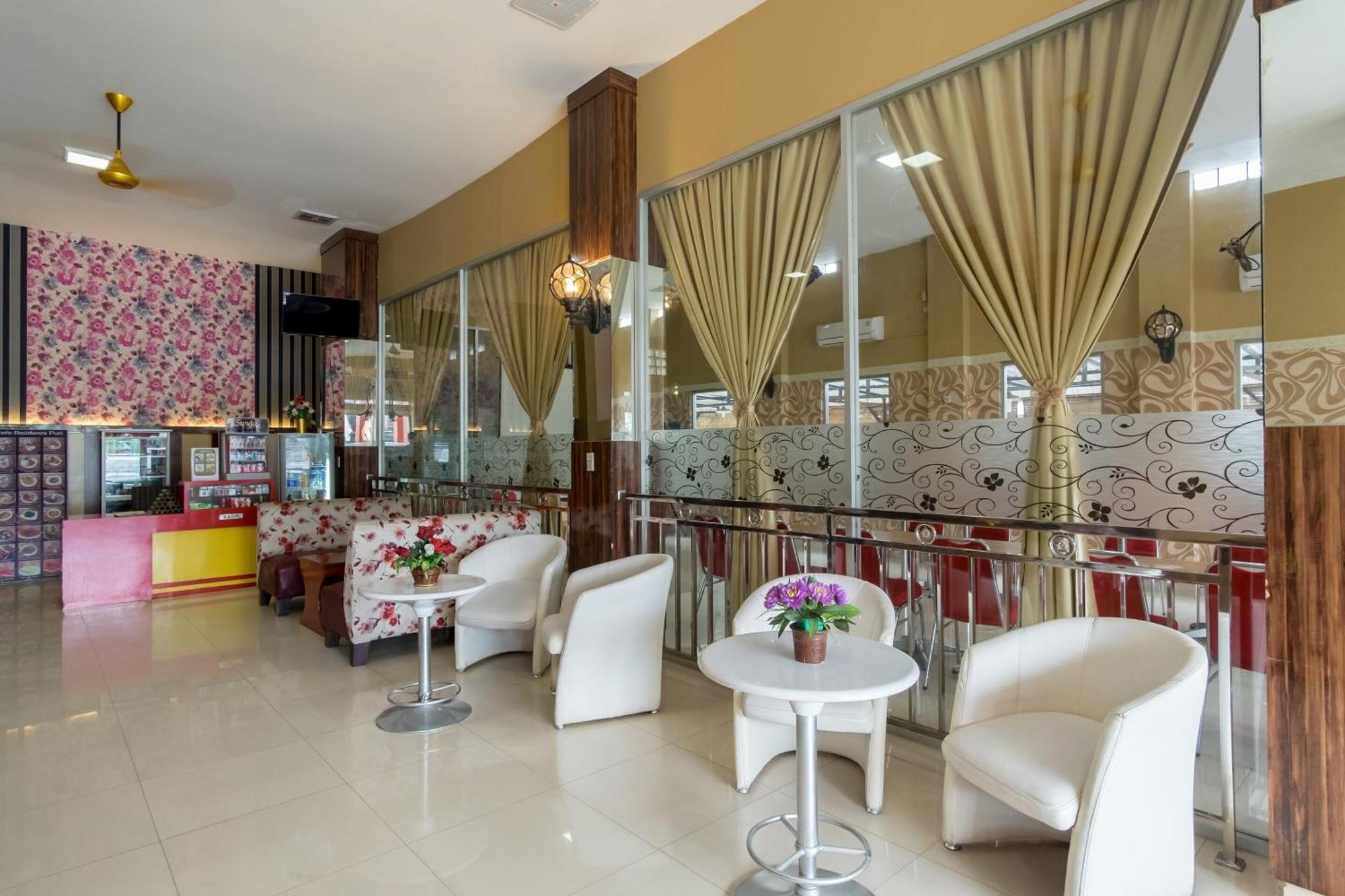 Capital O 615 Residence Puri Hotel Syariah Medan Buitenkant foto